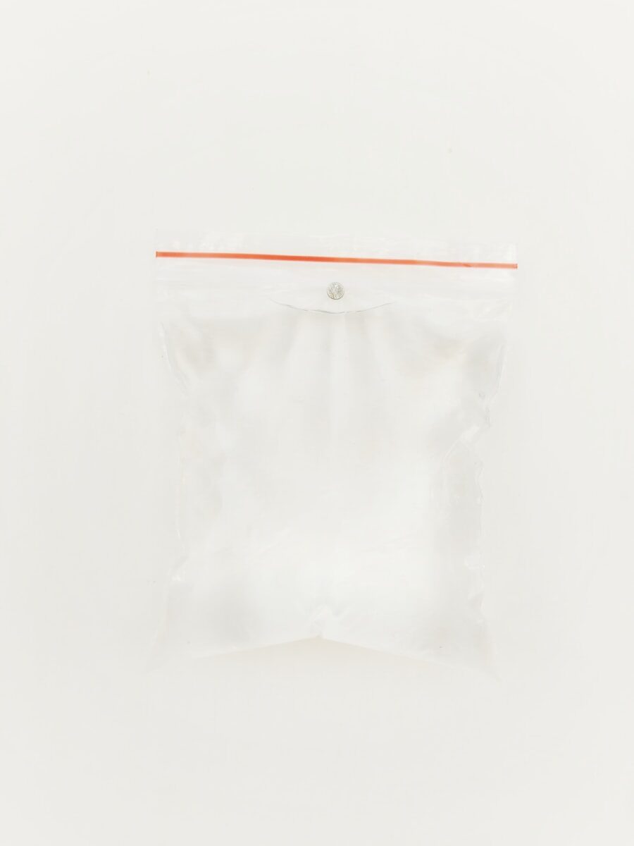 white plastic pack on white surface
